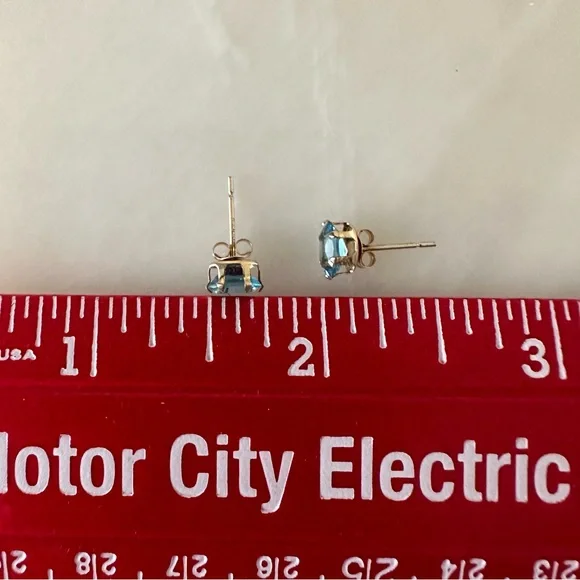 14k Solid Gold Blue Topaz Oval Post Earrings - Picture 9 of 13